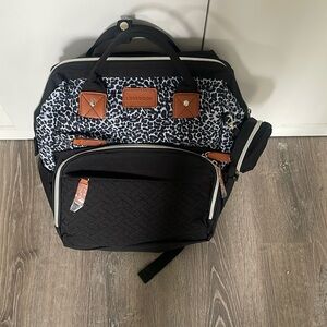 Brand new never used diaper bag with changing station and charger port